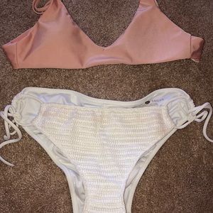 Precious pink bikini top with pearly white bottoms